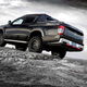Illustration for article titled The Mitsubishi Triton Absolute Will Not Apologize for All That Carbon Fiber